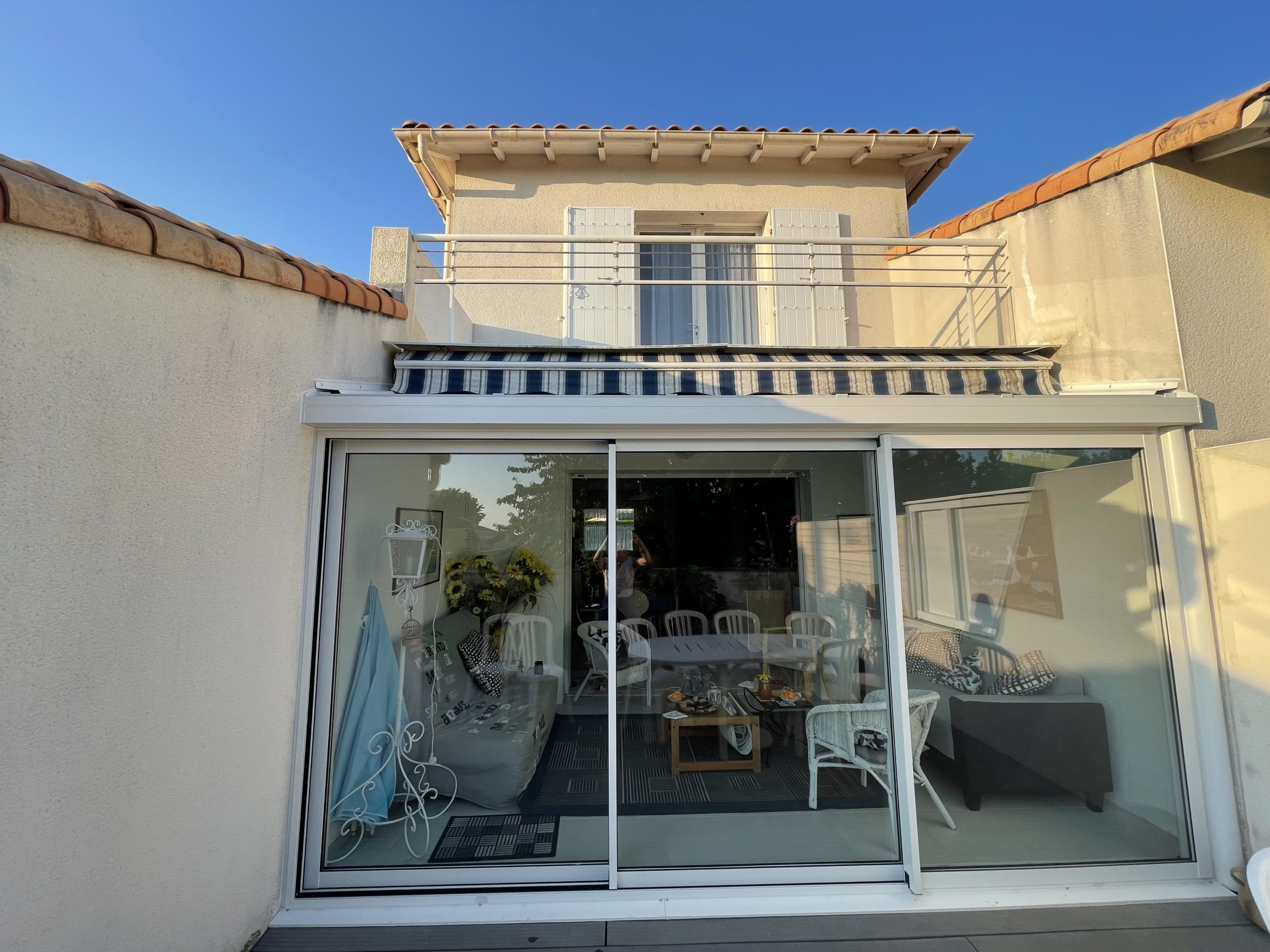 Entreprise pour Extension d'une maison de Vaux sur Mer par une véranda coulissants 3 vantaux proche de Royan.